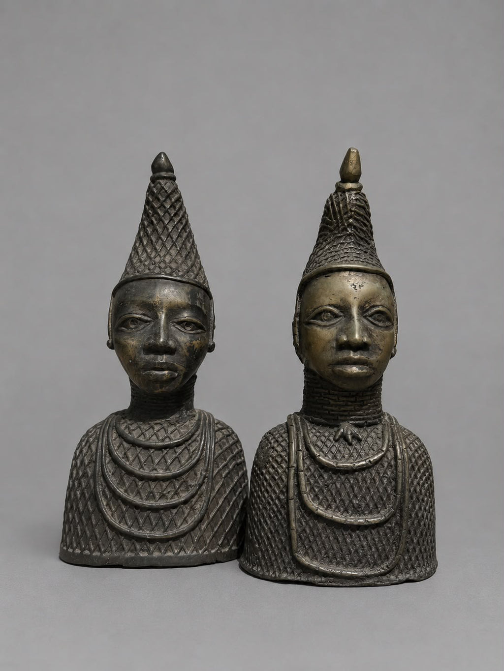 Pair of African Bronze Tribal Bust Sculptures