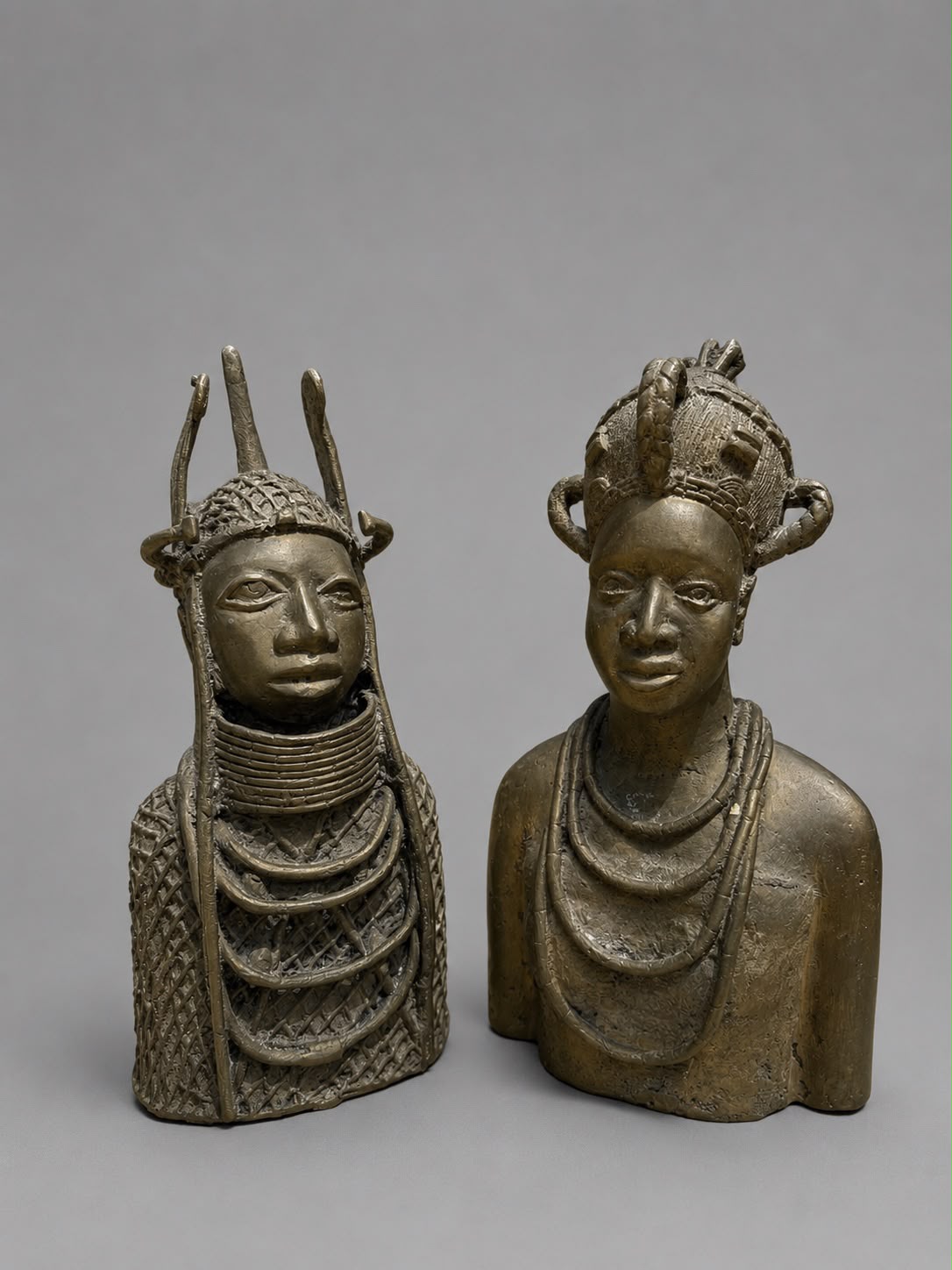 Pair of Vintage African Bronze Style Tribal Bust Sculptures
