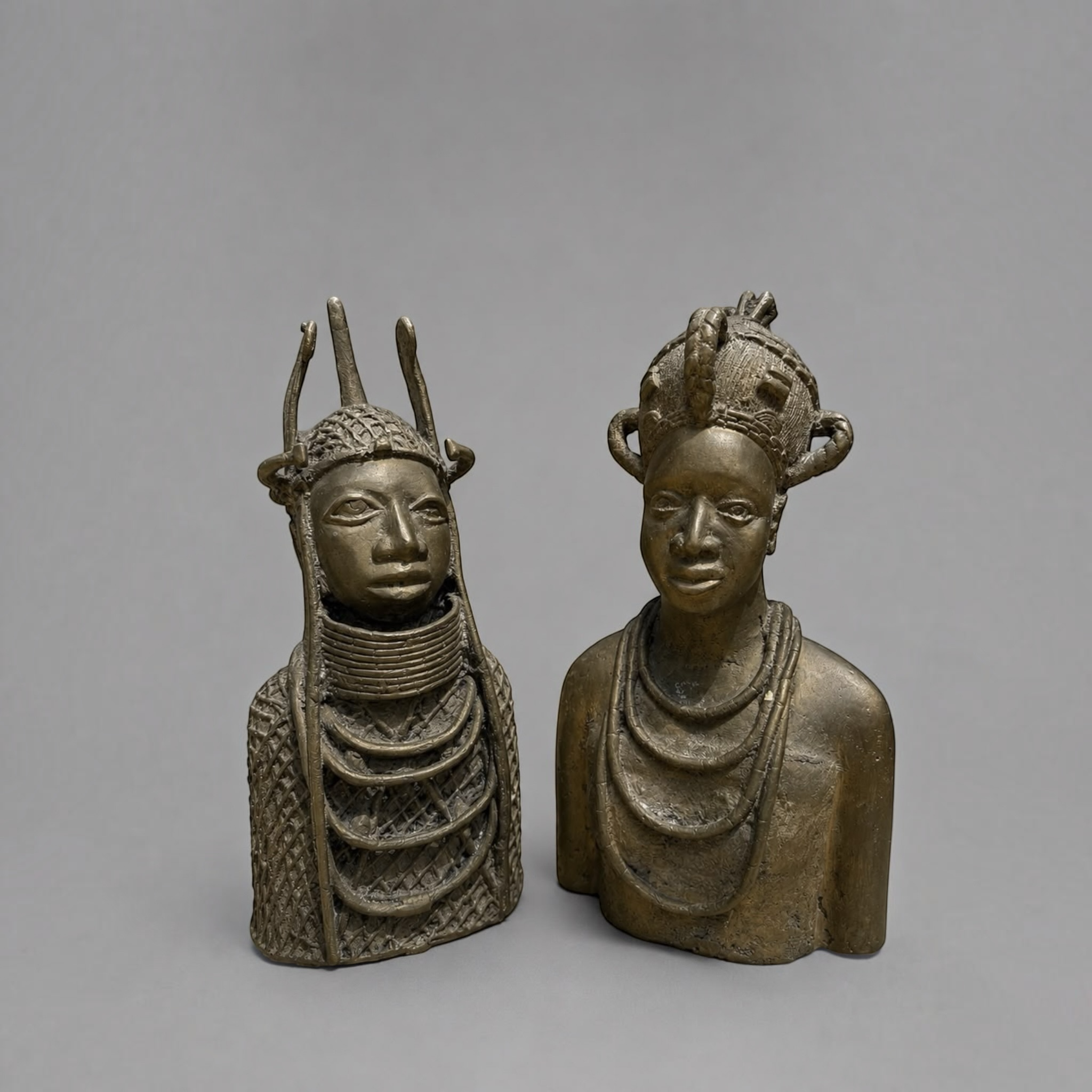 Pair of Vintage African Bronze Style Tribal Bust Sculptures