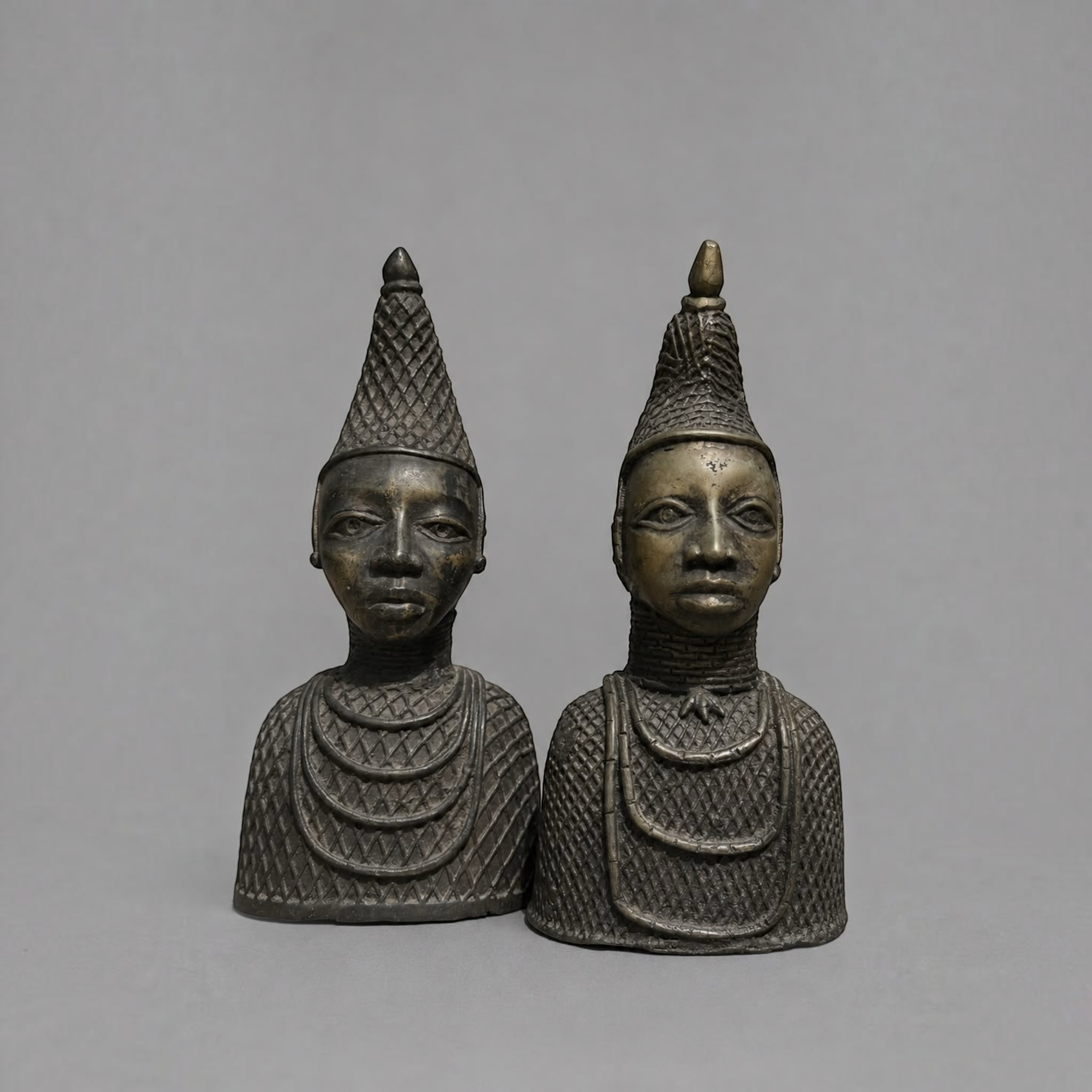 Pair of African Bronze Tribal Bust Sculptures